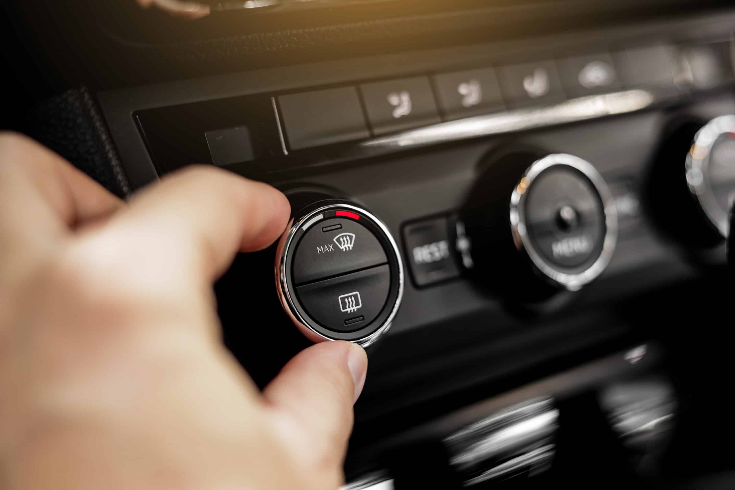 Closeup Of Hand Adjusting The Conditioner In A Mod 2026 03 10 02 03 18 Utc Scaled Car Heater